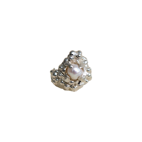 Single pearl earring with silver setting on a white background