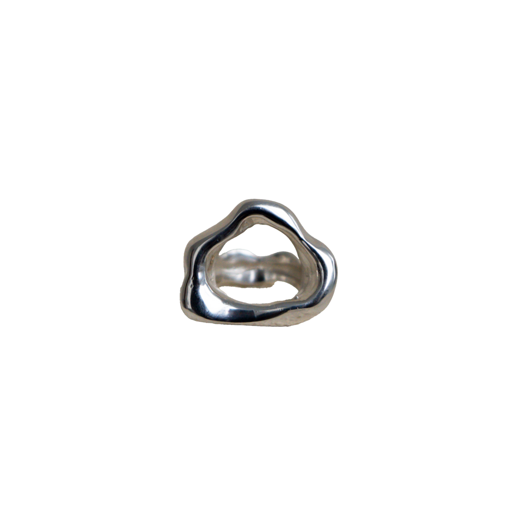 Silver ring with a unique, organic design on a transparent background